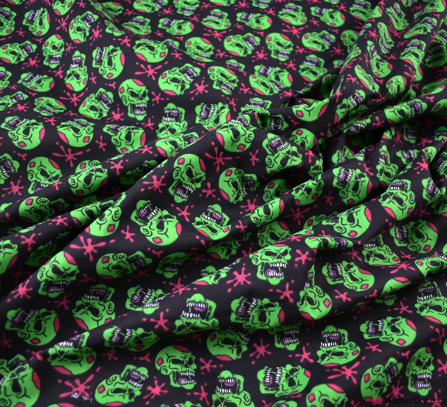 Polycotton Fabric - Scary Skulls Green